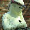 "Mother" (c) 2007; decorative ceramic birdhouse - I’d noticed, most of my life,
my mother never shed tears.
Fitting this sculpture with
staring blue eyes that seem
brimming with tears poignantly
contrasts with the adornment
and ‘giving’ and ‘sheltering’
feeling the piece yields.